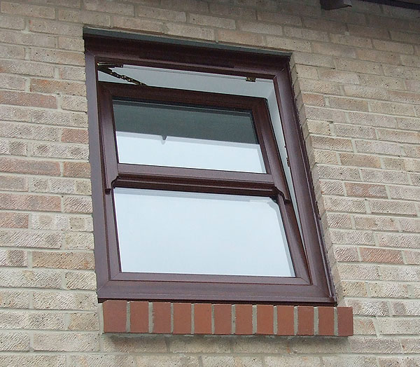 mahogany-tilt-and-turn-window-tilted run thru sash horns